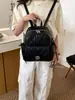 Mochila de verano para estudiantes que van al trabajo, bolso moderno y nuevo de patrón de diamantes informal y a la moda para mujeres 2026