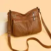 Bolsa feminina de couro macio multicamadas 2026 nova moda grande capacidade multi-compartimentos bolsa para mãe de meia-idade e idosa bolsa transversal casual
