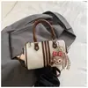 Bolso pequeño elegante de alta gama para mujer 2026 nueva moda versátil para el trabajo bandolera bolso de mano súper popular bolso almohada