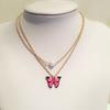 Conjunto de pendientes y collar de moda transfronteriza europea y americana, nuevo diseño de verano, con doble perla, aceite y mariposa, colgante para mujer.
