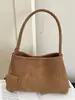 Bolsa tejida de axila de estilo francés de nicho Shuai Mi Jia para mujer, nueva bolsa elegante para el trabajo de otoño 2026, bolso de hombro vintage