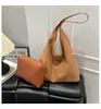2025 Súper Caliente Nuevo Bolso de Nicho Bolso de Axila para Viajar Bolso de Hombro Cruzado Versátil de Moda para Mujer