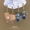 Aretes de aguja plateada con colgantes de borlas de diamante, circonita y cristal, aretes estilo resort de playa, aretes de lujo ligero de alta gama al por mayor