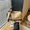 Bolsa de ombro e transversal para o dia a dia com estampa de leopardo, design de nicho transfronteiriço, nova moda outono 2026, grande capacidade