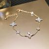 Pulsera de Flor de Cuatro Pétalos de Circonita de Lujo Ligero de Alta Calidad para Mujer Moda Versátil Joyería para el Festival Qixi Transfronteriza Accesorios de Yiwu