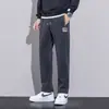 Pantalones de pana para hombre, versátiles, forrados de polar, para invierno, transfronterizos, sencillos, elegantes, holgados, cómodos y casuales