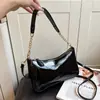 Moda Otoño 2026 Color Sólido Cuero Brillante Casual Simple Gran Capacidad Bolso de Hombro Cruzado Bolso de Mano Bolso de Axila