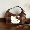 Novo estilo de comércio exterior: padrão xadrez retrô, bolsa de mão temática de gato, moderna e fofa, para mulheres, versátil e estilosa, pode ser carregada sob o braço, na transversal ou no ombro