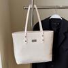 La popular bolsa de mano grande casual retro simple de este año para mujer, para el trabajo y los desplazamientos, bandolera de color liso versátil