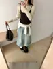 Fábrica de Suéteres Dalan Source conjunto de dos piezas de punto de manga larga para otoño e invierno con camisola, top de punto de cuello redondo para mujer, top versátil para capas