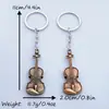 Llavero de metal para guitarra violín retro cadena de llavero de personalidad creativa accesorios colgantes joyería transfronteriza venta al por mayor