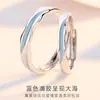 Anillo Romántico Nuevo de la vida Runxin para amantes hombres y mujeres un par de anillo abierto anillo de corazón oceánico con pegamento azul