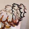 ¡Diadema de onda! Dulce nuevo estilo limpiador facial no clip sensación de textura esponjosa con peine de dientes sentido del diseño antideslizante diadema