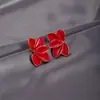 Brincos estilo retrô Hong Kong folha de bordo gota de óleo flor design de moda metal pétala de vento brincos atacado