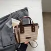 Bolsa Nova Tendência Primavera 2026 para Mulheres Estilo Coreano Bolsa Tote Simples Trançada Moda Retro Bolsa de Ombro de Axila