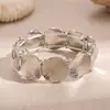 Pulsera elástica de disco plisado transfronteriza europea y americana, pulsera de lujo ligero y de alta gama, diseño exagerado personalizado, joyería de mano de nicho