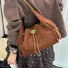 Bolso nuevo de un solo hombro para debajo del brazo con patrón de diamantes, textura retro de gamuza 2026, tote de uso diario para otoño e invierno, exquisito estilo coreano para mujer