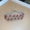 [Cadena de Diamantes Arcoíris] Pulsera de extracción de zircón trenzado en cruz, una pulsera lujosa y de alta gama, una pieza de joyería delicada y de moda