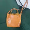 2025 Nuevo Modelo Cuero de Cristal de Capa Superior Curtido Vegetal Bolso de Mano de Moda Versátil Cruzado al Hombro Estilo Coreano Bolso para Teléfono Madre e Hija
