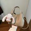 Bolsa de mão com padrão de lichia, design de nicho coreano, pequena bolsa tote, elegante e versátil, adequada para o trabalho, bolsa feminina, transfronteiriça