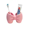 Portacepillos de dientes con forma de lazo superventas transfronterizo, estante para cepillo de dientes y pasta de dientes de lavabo, soporte de almacenamiento, organizador de cepillos de dientes de escritorio