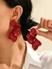 Fornecimento exclusivo transfronteiriço de brincos grandes de pétalas tridimensionais multicoloridos foscos de design de nicho em estilo minimalista europeu e americano novo para mulheres, estilo exagerado