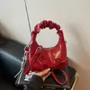Bolsa de Mão Plissada com Laço Transfronteiriça para Mulheres 2026 Verão Novo Estilo Corrente Versátil Bolsa de Ombro Bolsa Transversal com Acabamento de Alto Padrão