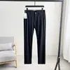 Suaves y Frescos, con una Sensación Helada, Pantalones Casuales de Moda Versátiles para Hombre, Repelentes al Agua y Elásticos en Cuatro Direcciones, para el Trayecto al Trabajo