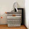 Bolsa de lona de gran capacidad 2026 para exteriores, compras, con estampado de letras, bandolera, versión coreana, bolsa de mano simple y casual, almacenamiento