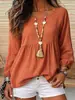 Camisa de muñeca estilo resort de comercio exterior con lino texturizado, cuello redondo, mangas largas con puños, dobladillo plisado y diseño holgado de jersey