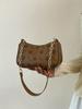 Bolsa de Meia-Lua Fashion Estilo Western Casual com Corrente de Mão Feminina 2024 Nova Simples de Ombro Bolsa Transversal Retrô