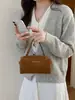 Bolsa Redonda Cilíndrica Retro Melanoid para Mano Mujer Otoño 2026 Nueva Patchwork de Gamuza Bolsa Almohada Cadena Bolso de Hombro Único Cruzado