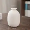 Estilo Ins Jarrón Pequeño de Cerámica Blanca DIY Pintado Graffiti Liso Quemado Jarrón Pequeño Hogar Escritorio Entrada Jarrón para Flores Secas