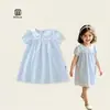 Vestido bordado de verano 2026 para niñas con dulce cuello Peter Pan y manga corta, directo de fábrica, versión coreana, atuendo de verano