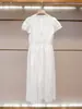 Vestido de Verano Nuevo de Alta Gama para Mujer de Shenzhen Estilo Casual Elegante Francés Bordado Hueco Blanco Manga Corta