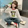 Camiseta de manga larga a rayas de algodón puro para niña, nuevo estilo primavera y otoño 2026, holgada y elegante, camiseta básica versátil para niños