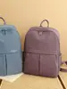 Mochila de viaje, para ir al trabajo y para la escuela de diseño minimalista, tela de nailon, impermeable, versátil, moderna, mochila para mujer de estilo simple