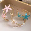 Pulsera Metálica Esmaltada de Estrella de Mar Europea y Americana Transfronteriza Abrible Pulsera Retro Moda con Temperamento Lujo Ligero Sensación de Alta Gama Joyería de Mano para Mujer