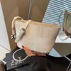 Bolsa Feminina de Nicho Super Popular 2026 Nova Tendência Moda Primavera Versátil Bolsa de Ombro de Alta Qualidade Bolsa Transversal Tipo Balde