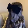 Horquilla para el pelo con lazo de terciopelo negro extragrande y rígido de estilo francés superior, accesorio exagerado para el cabello de rostro pequeño.