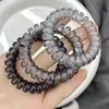Elegante anillo de pelo de línea telefónica transparente de color claro para viento frío negro ins alto valor de color no daña el pelo cuerda para el pelo sin costuras