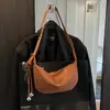 Bolsa transversal de ombro grande capacidade outono e inverno retrô transfronteiriça nicho novo para mulheres 2026 bolsa de chifre fosco bolsa de ombro bolinho