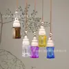Mini botella ambientador para coche con correa para colgar, botella dispensadora de perfume, botella difusora colgante para interior de coche, botella de vidrio de aromaterapia