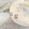 Pendientes de aleación de cobre pendientes con pasador de plata S925 pendientes de circón de trébol de cuatro hojas diseño exquisito pendientes de temperamento versátiles para mujer