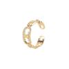 Anillo hueco abierto micro-incrustado de circonita europea y americana, viento celi de lujo ligero francés, pulsera con patrón del Arco del Triunfo para mujer