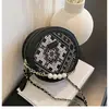 Bolsos de Diseño Nicho para Mujer Primavera y Verano Versátil 2025 Nueva Moda Cadena Hombro Cruzado Bolso Redondo Pequeño Estilo Coreano