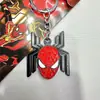 Llavero Giratorio de Spider-Man Reunión Iron Man Logo Metálico Llavero para Coche Colgante para Mochila Escolar de Hombres y Mujeres
