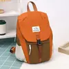 Mochila casual transfronteriza 2026 nueva, unisex, estilo coreano, gran capacidad, ligera, adecuada para ir al trabajo y viajes al aire libre
