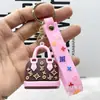 Llavero colgante de bolsa de burro simulada transfronteriza, colgante de minibolso estilo Chanel, muñeca linda regalo pequeño al por mayor