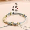 Pulsera de hebilla de paz cuerda trenzada producto semiacabado hecho a mano se puede usar como flor de solapa cuentas de transferencia doradas año zodiacal pulsera de cuerda roja para mujer
